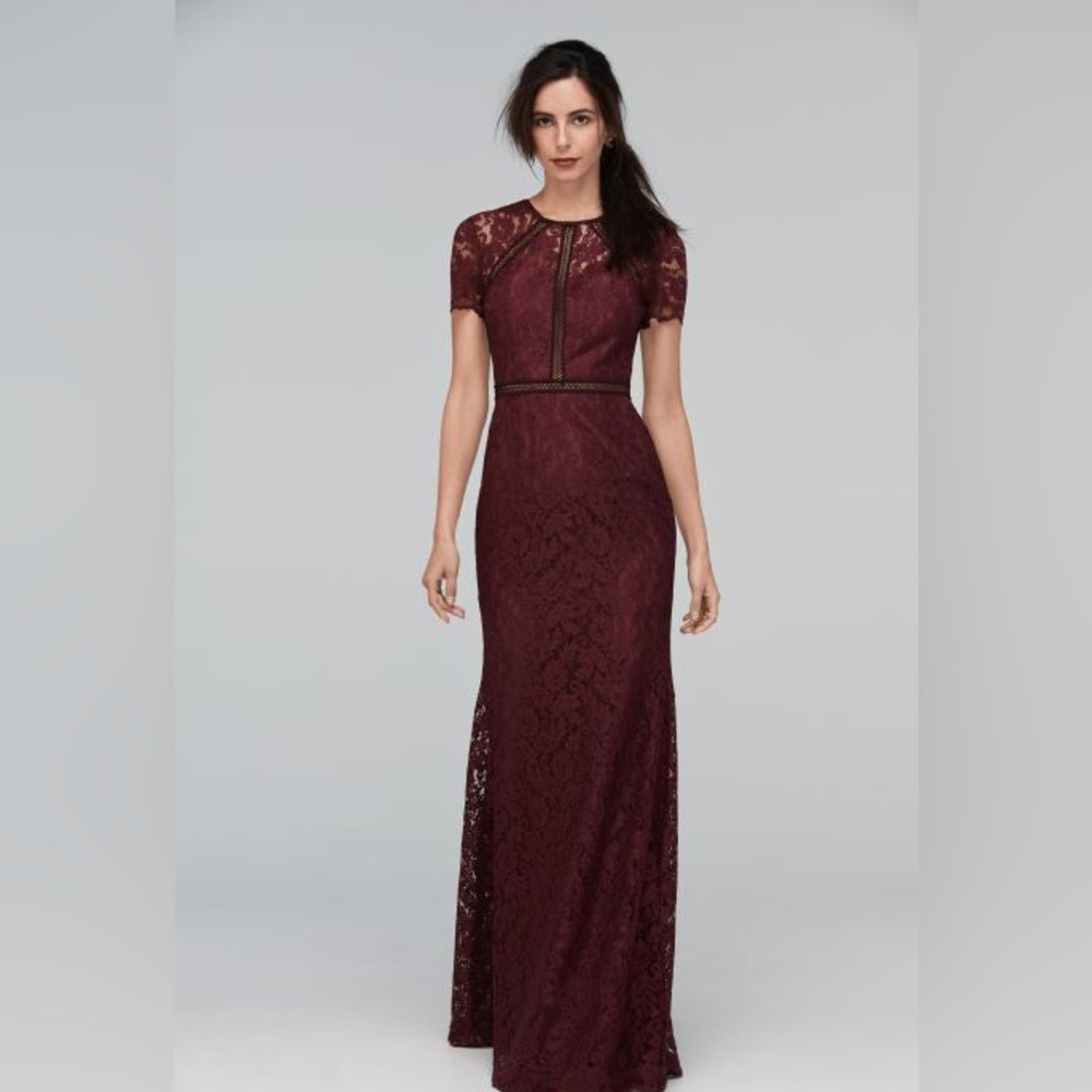 Unique lace cap sleeved dress in wine colored lace